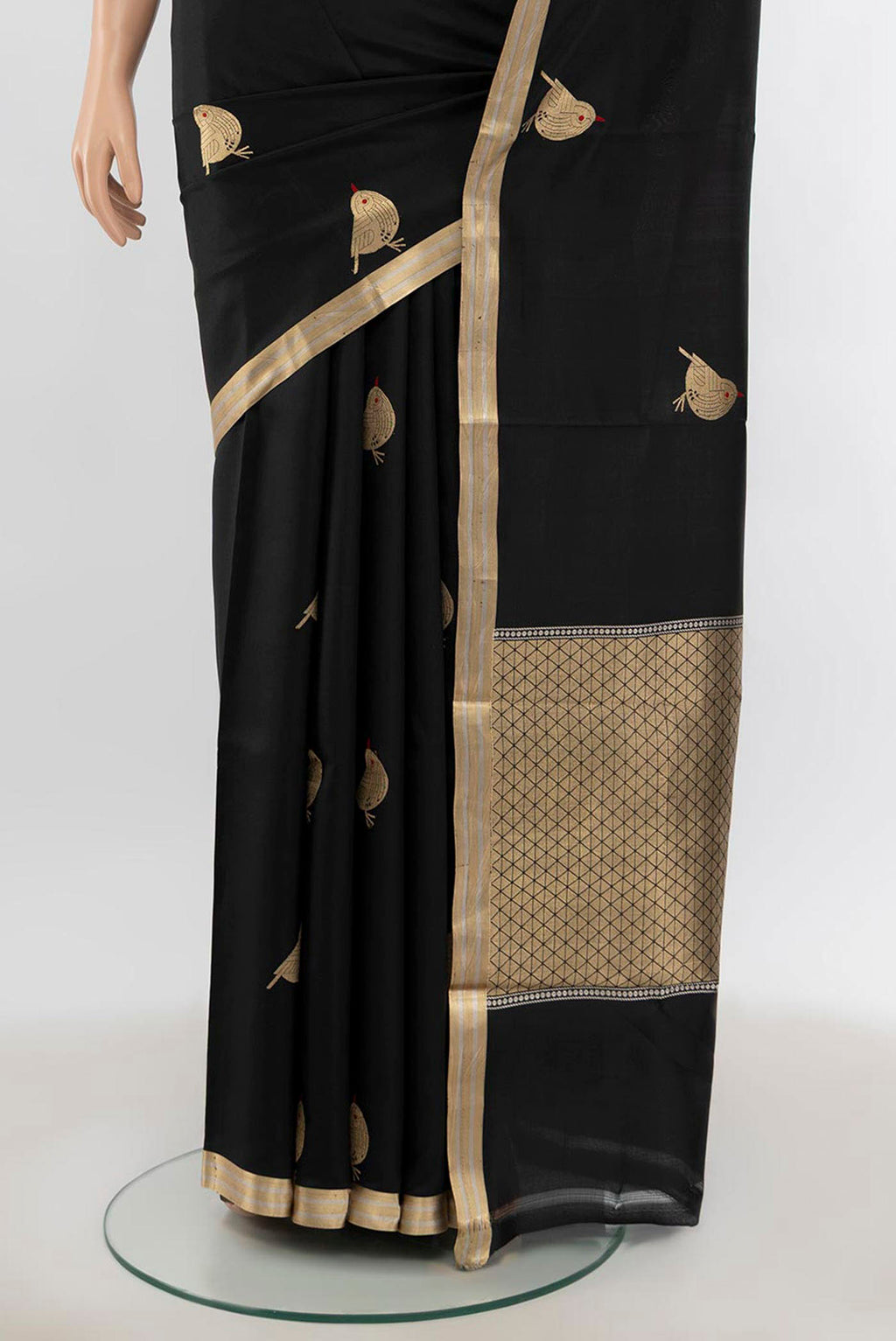 Pleats and pallu of Black Banarasi Katan Silk Saree with Zari Butta on the body and Silk Border. 