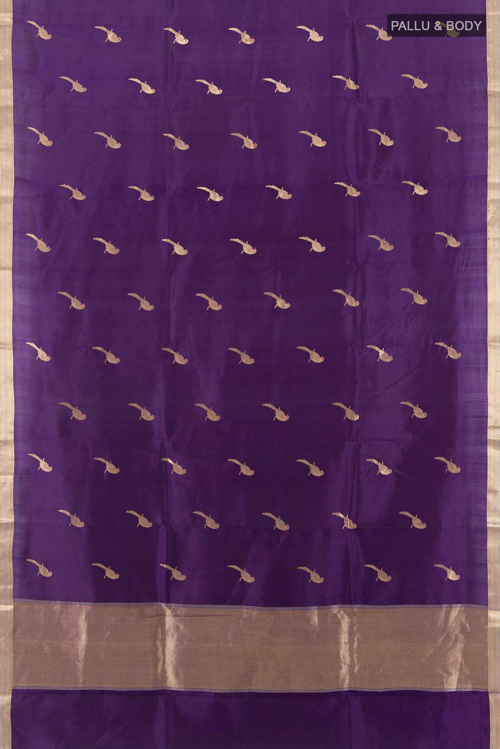 Flat view of Purple Banarasi Katan Silk Saree with Zari Butta on the body and Zari Border. 