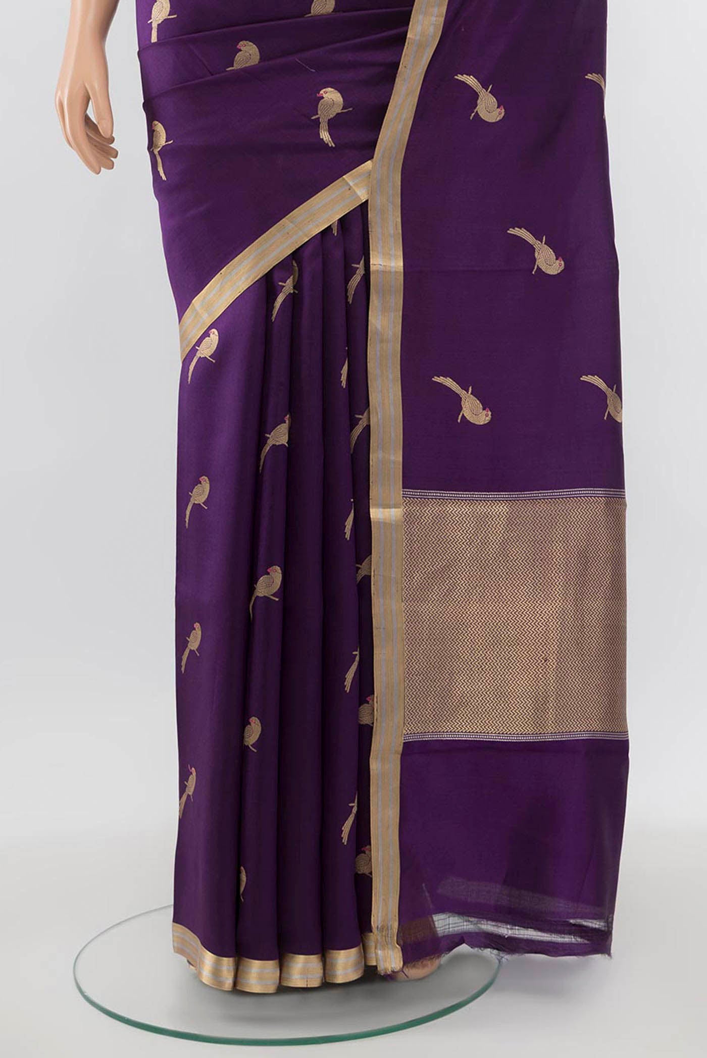 Pleats and pallu of Purple Banarasi Katan Silk Saree with Zari Butta on the body and Zari Border. 