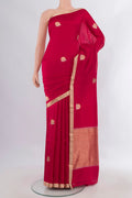 Pure Silk Red Banarasi Katan Saree with Zari Butta on the body and Zari Border.  displayed on a mannequin