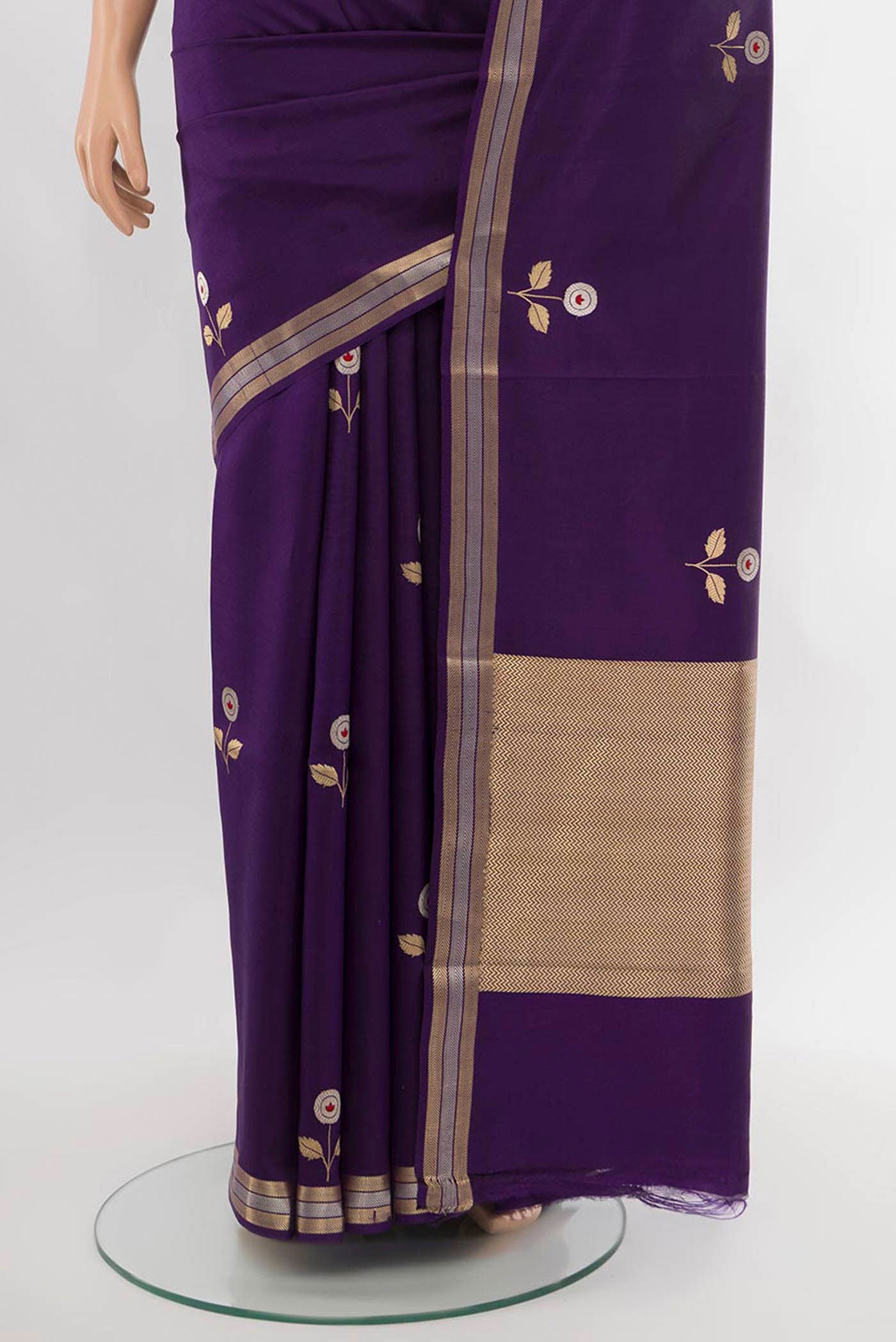 Pleats and pallu of Violet Banarasi Katan Silk Saree with Zari Butta on the body and Silk Border. 