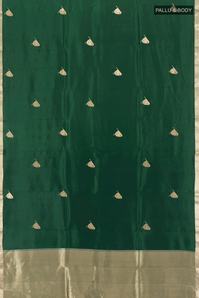 Flat view of Bottle Green Banarasi Katan Silk Saree with Zari Butta on the body and Silk Border. 