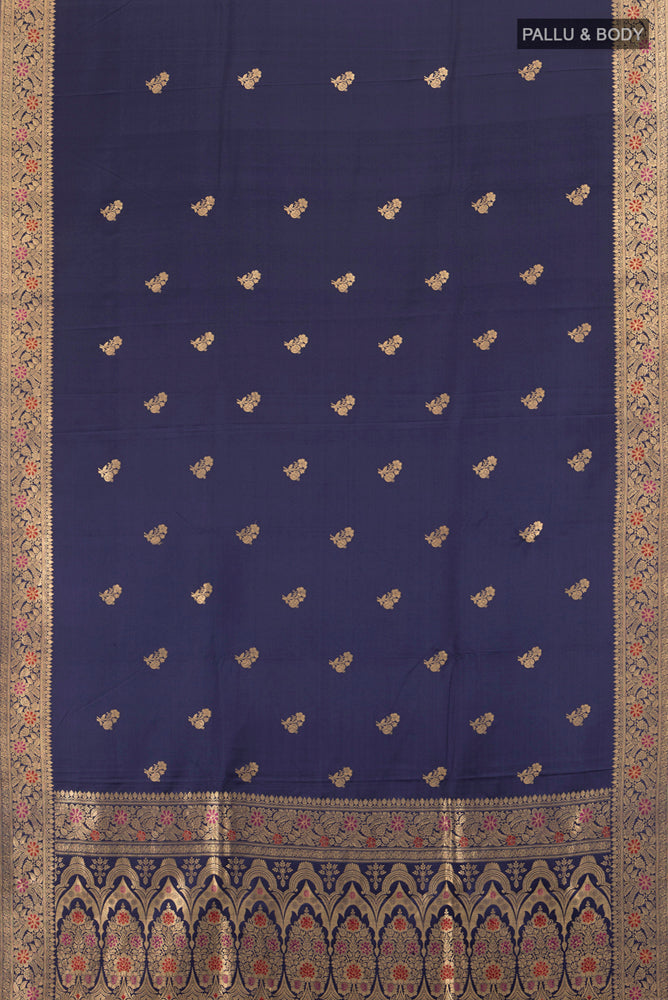Flat view of Pure Silk Pure Zari Navy Blue Banarasi Katan Saree with Zari Butta on the body and Silk Border. 