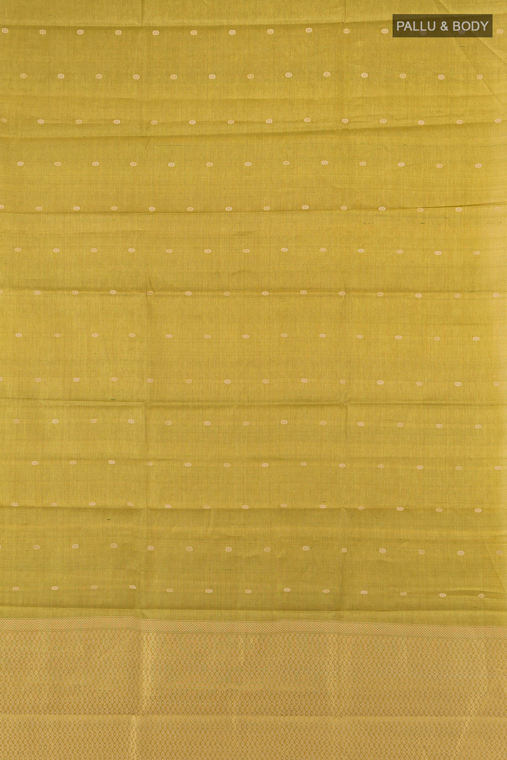 Flat view of Golden Tussar Silk Saree with Zari Butta on the body and Zari Border. 