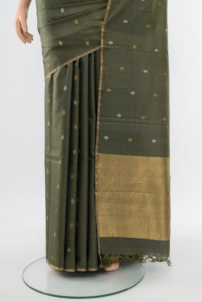 Pleats and pallu of Multi Color Tussar Silk Saree with Zari Butta on the body and Silk Border. 