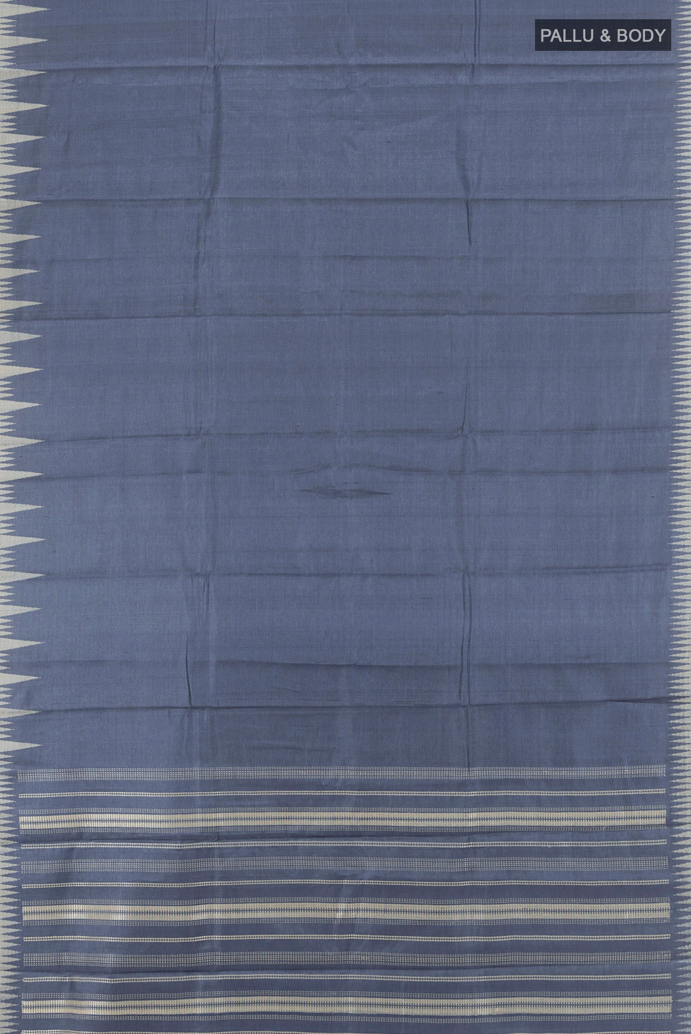 Flat view of Navy Blue Tussar Silk Saree with Plain Body and Temple Border. 