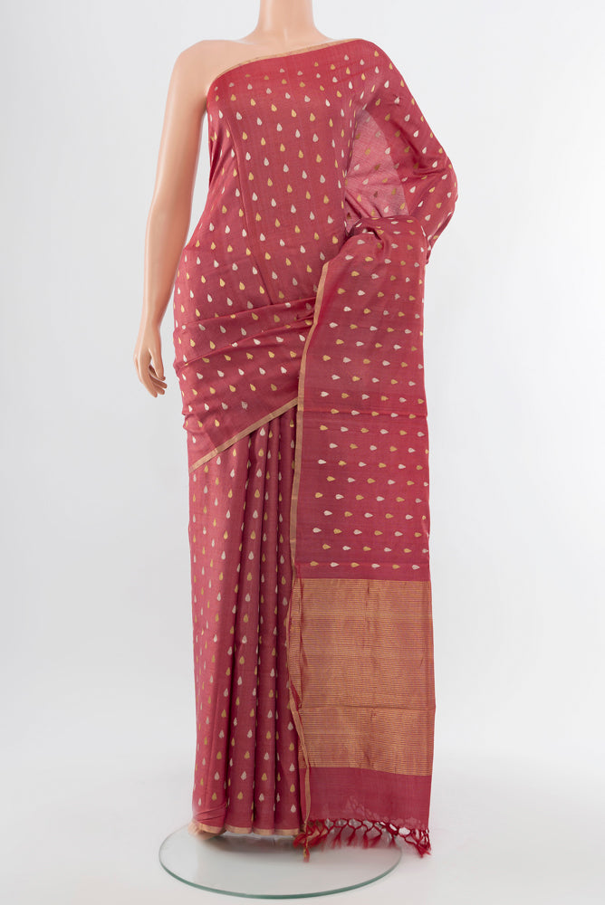 Bronze Tussar Silk Saree with Zari Butta on the body and Silk Border.  displayed on a mannequin