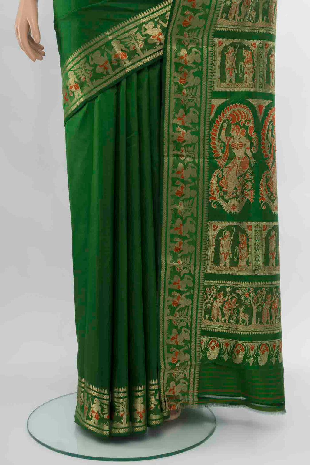 Pleats and pallu of Bottle Green Baluchari Silk Saree with Zari Butta on the body and Silk Border. 