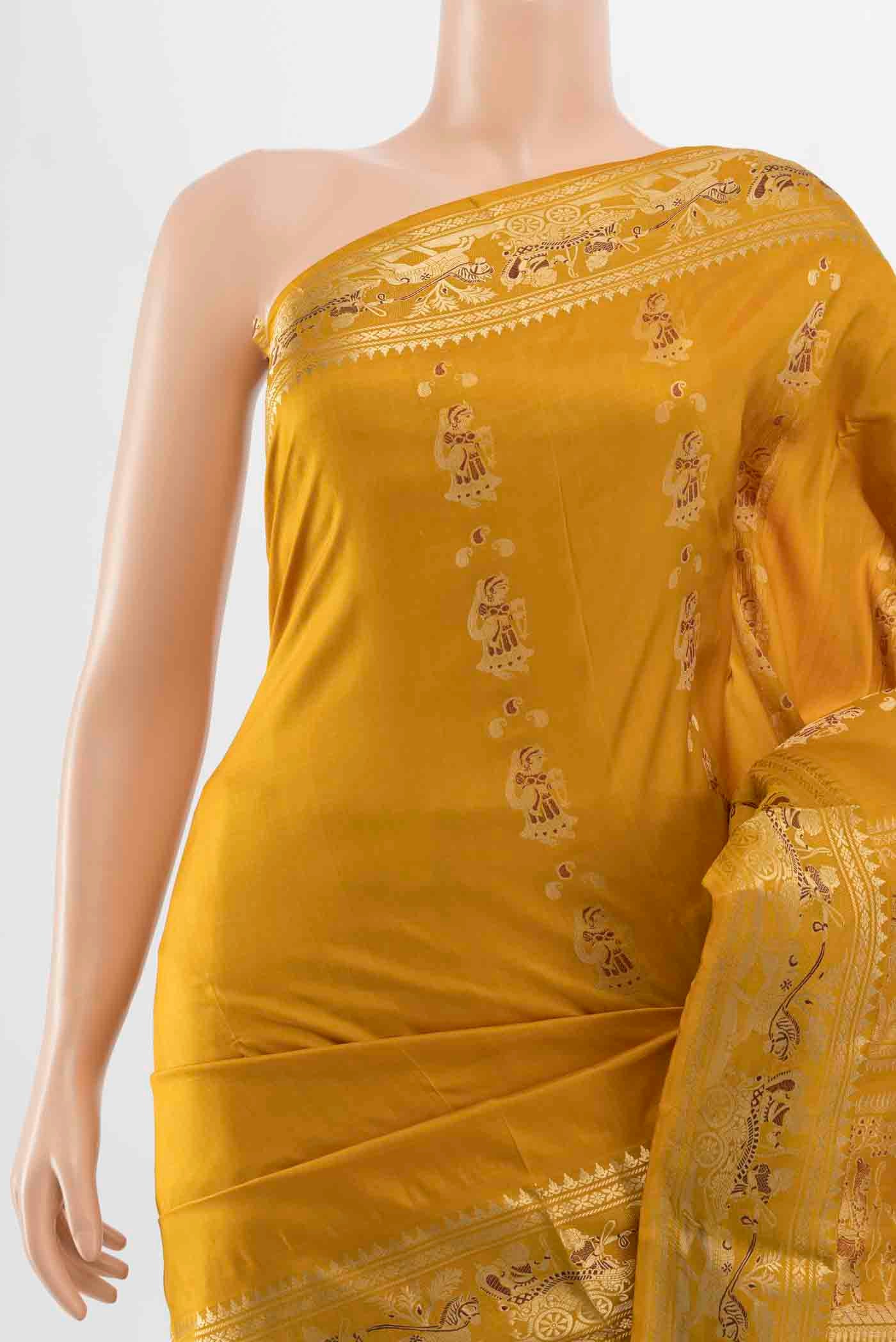 Border image of Mustard Baluchari Silk Saree with Zari Butta on the body and Silk Border