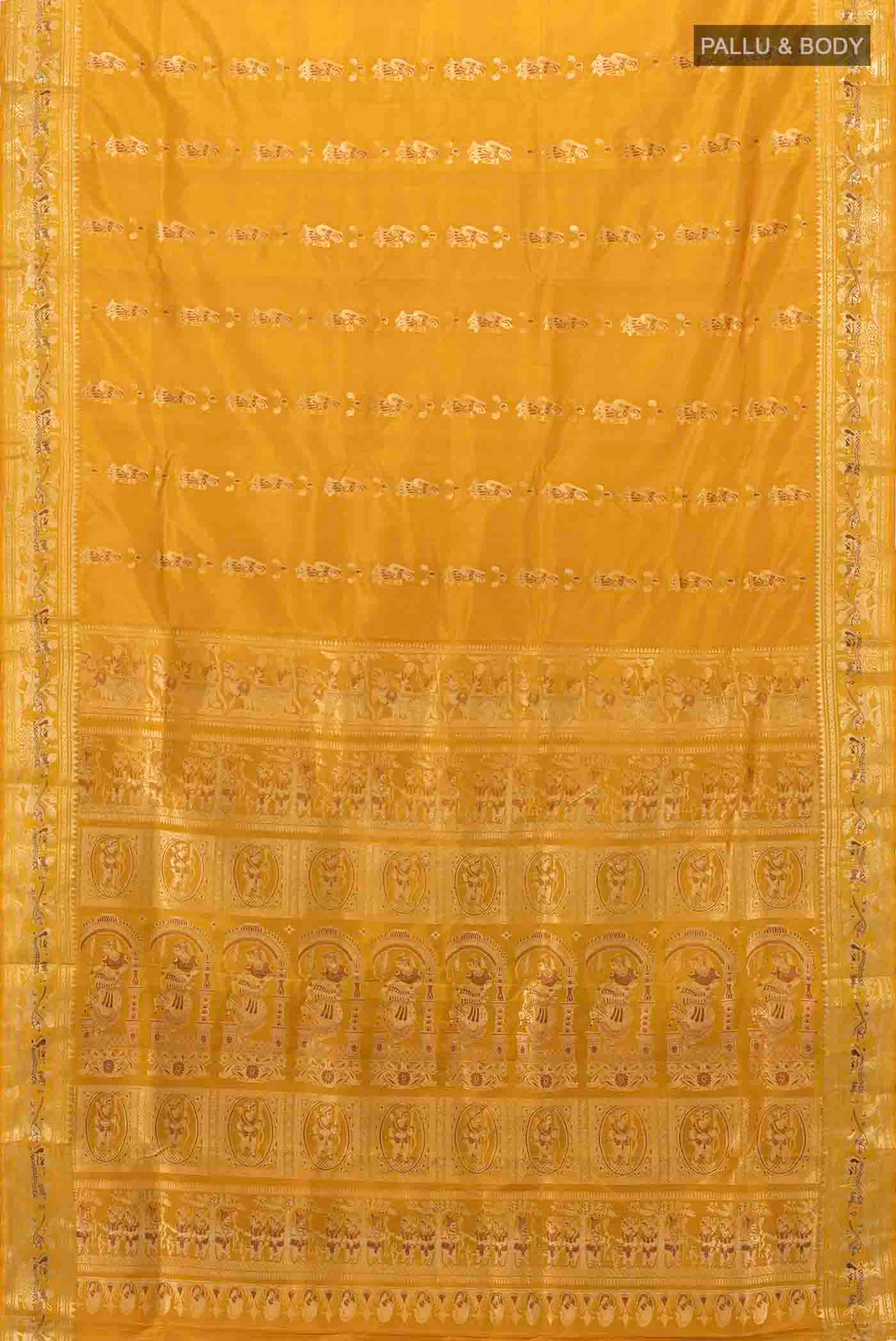 Flat view of Mustard Baluchari Silk Saree with Zari Butta on the body and Silk Border