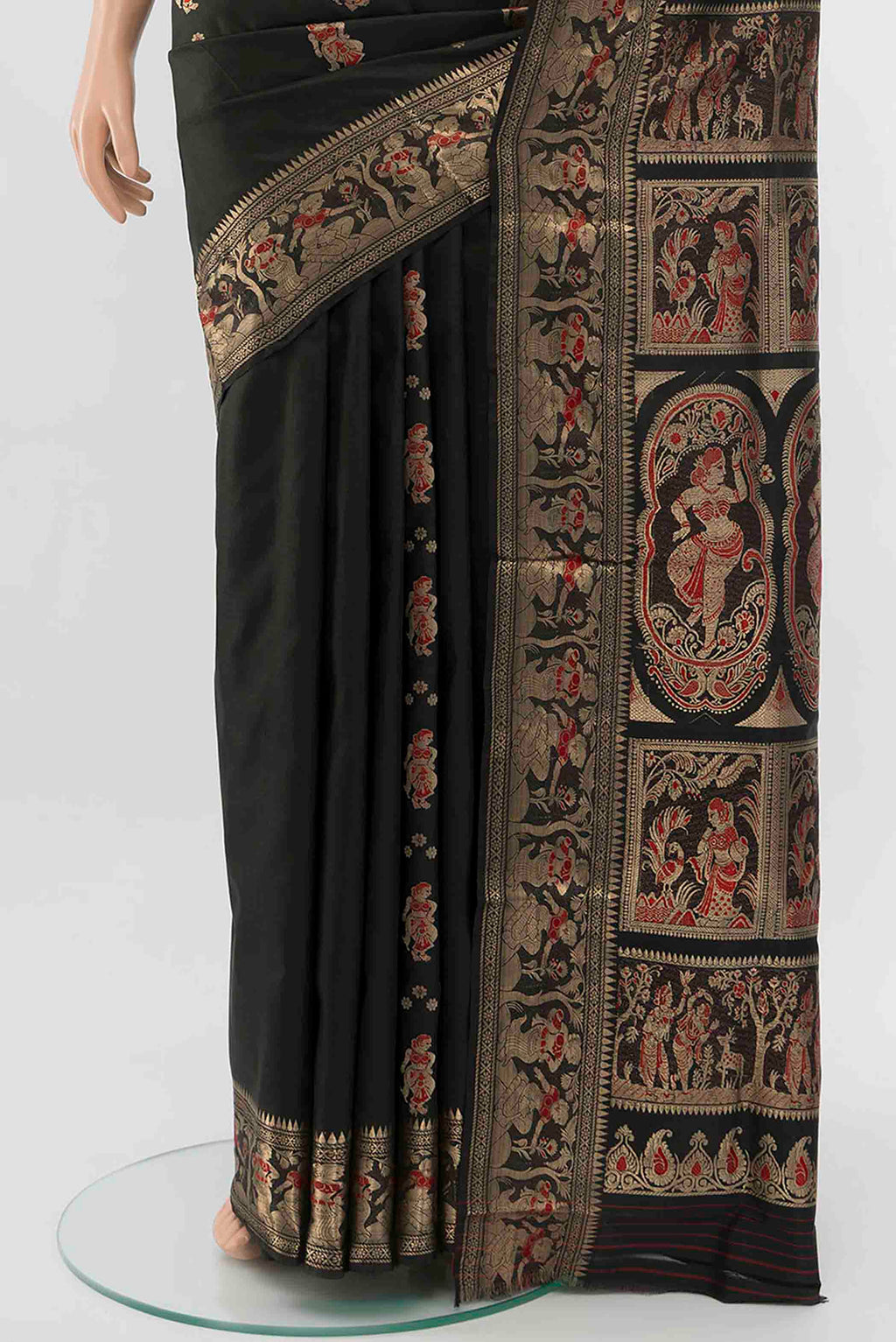 Pleats and pallu of Black Baluchari Silk Saree with Zari And Thread Butta on the body and Zari Border