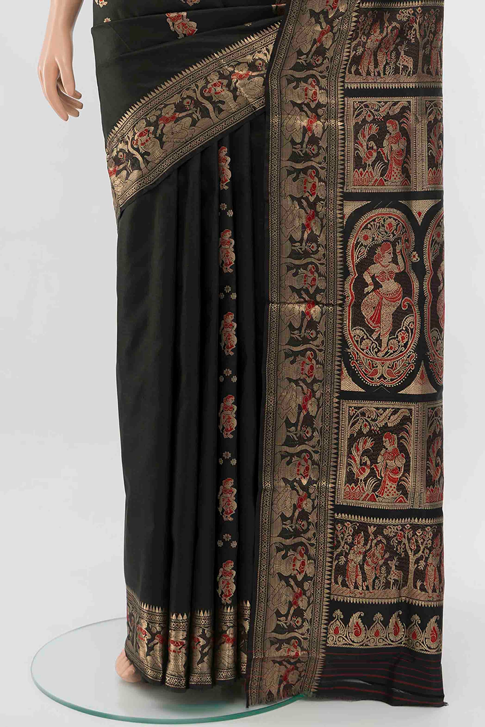 Pleats and pallu of Black Baluchari Silk Saree with Zari And Thread Butta on the body and Zari Border