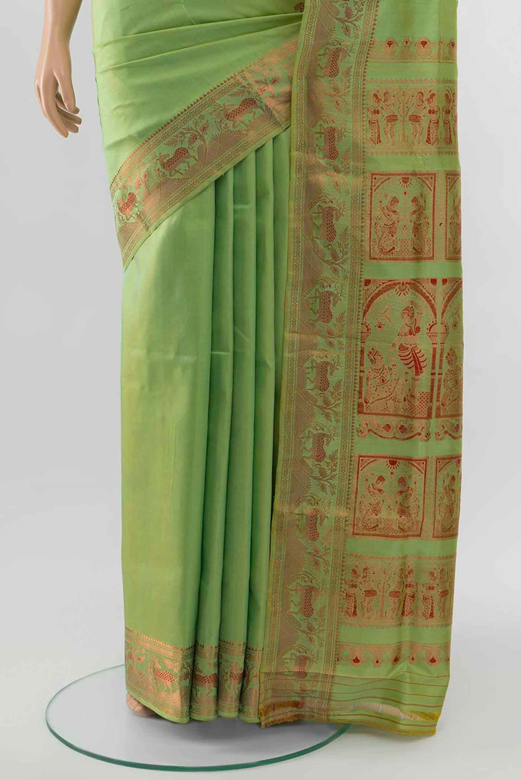 Pleats and pallu of Pista Green Baluchari Silk Saree with Zari Brocade on the body and Silk Border