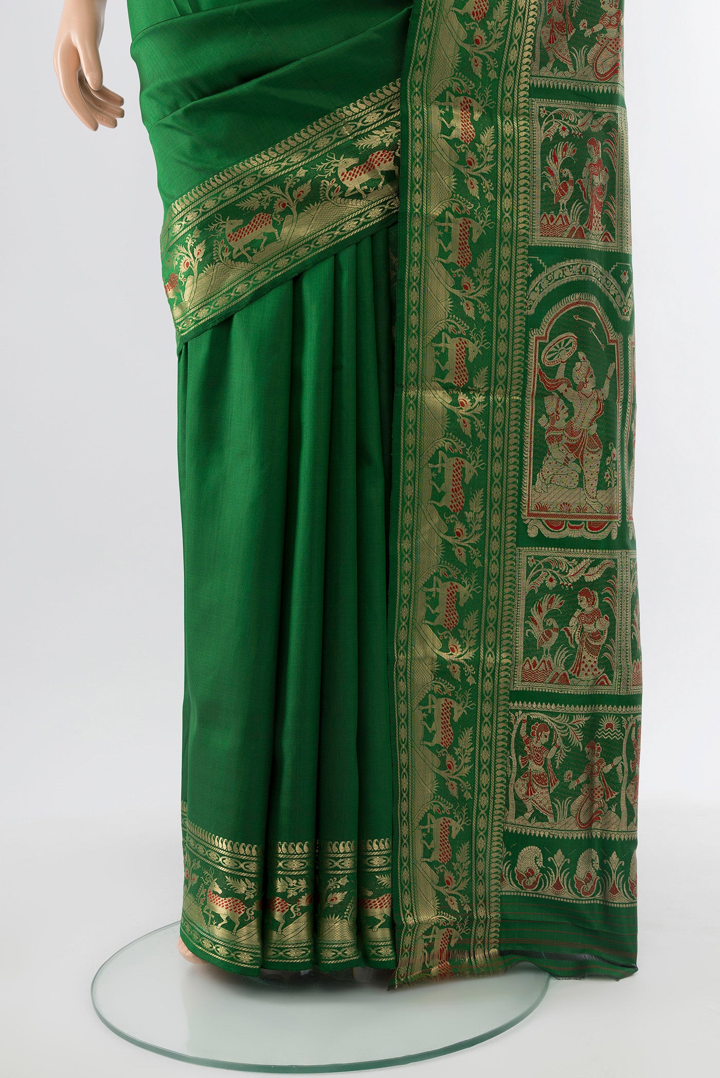 Pleats and pallu of Bottle Green Baluchari Silk Saree with Zari Butta on the body and Silk Border. 