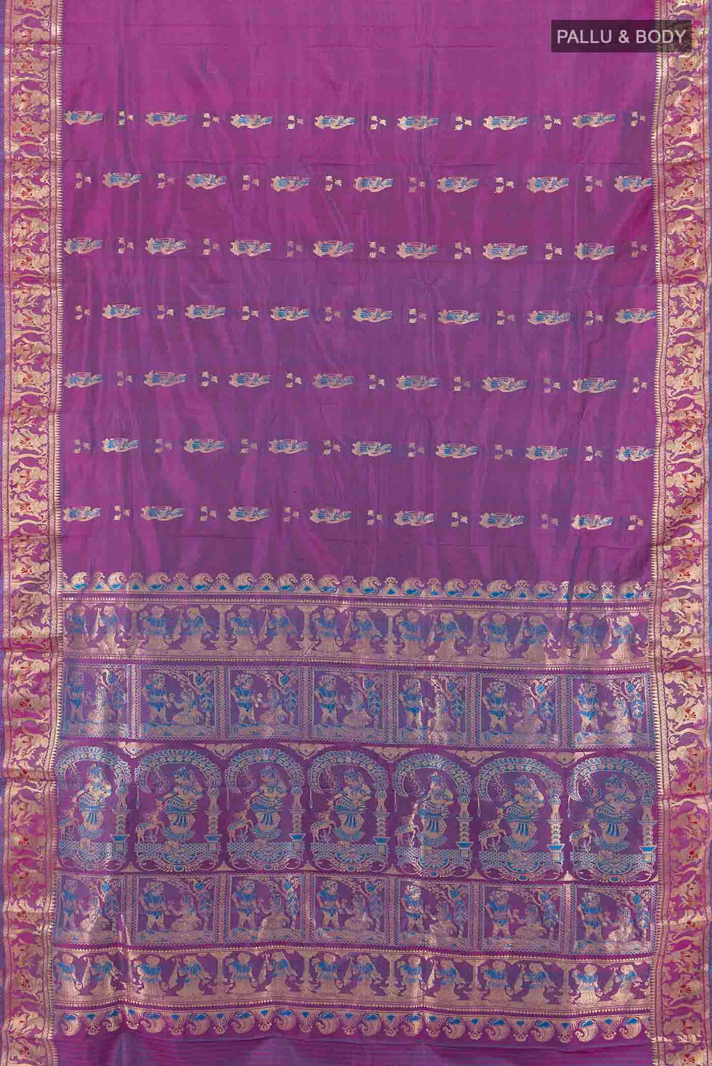 Flat view of Purple Baluchari Silk Saree with Zari Butta on the body and Silk Border. 