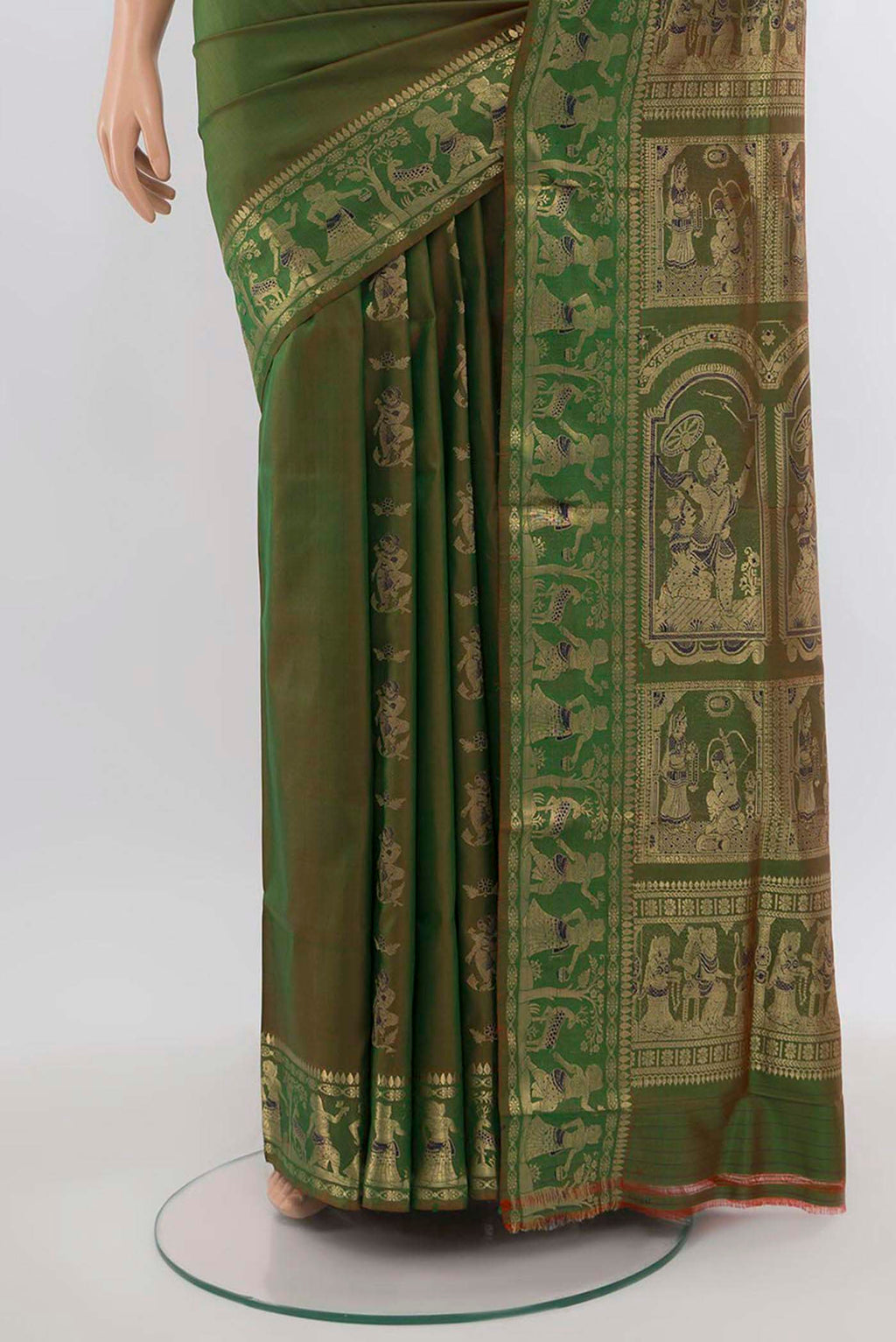 Pleats and pallu of Mehandi Green Baluchari Silk Saree with Zari Butta on the body and Silk Border. 