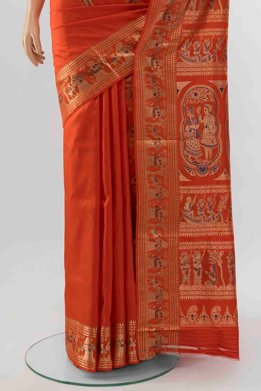 Pleats and pallu of Brick Orange Baluchari Silk Saree with Zari Brocade on the body and Silk Border