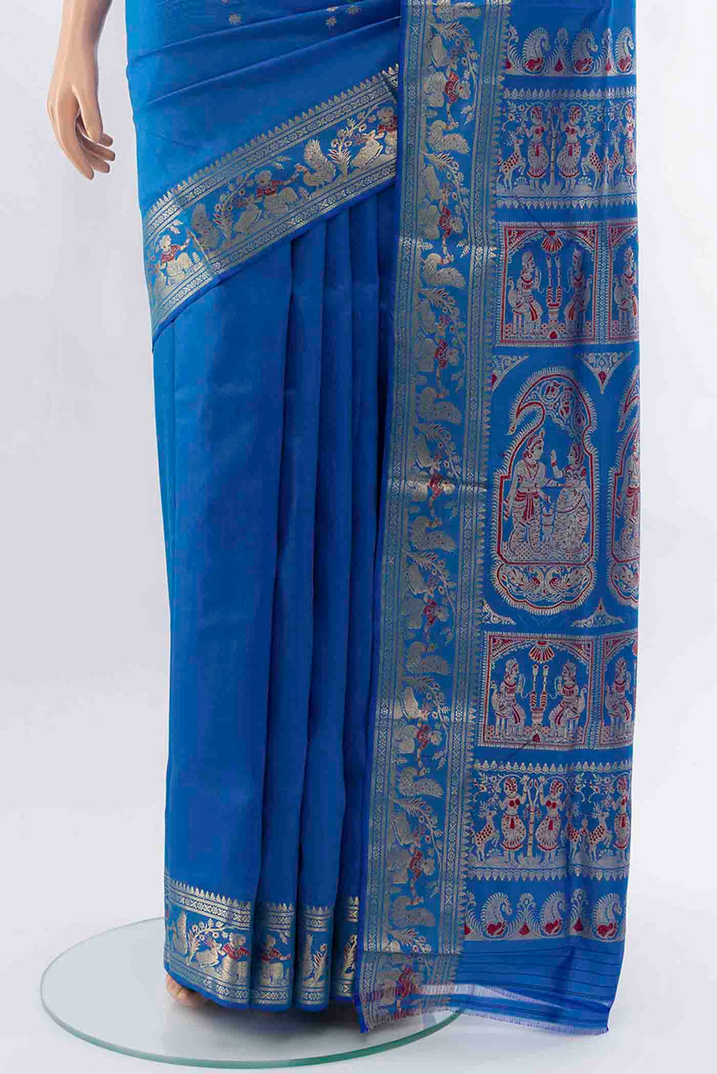 Pleats and pallu of Royal Blue Baluchari Silk Saree with Zari And Thread Butta on the body and Zari Border
