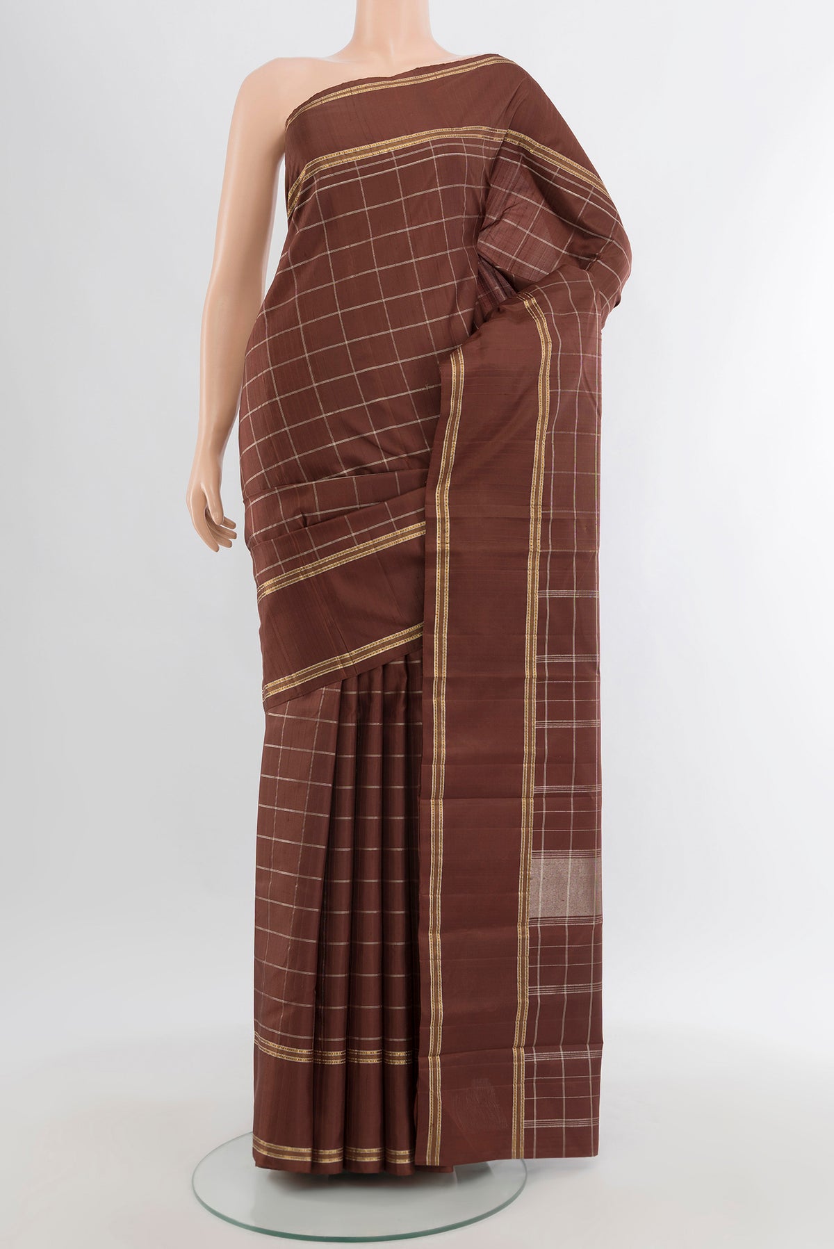 Brown Kanchipuram Silk Saree with Checked design on the body and Plain Border.  displayed on a mannequin