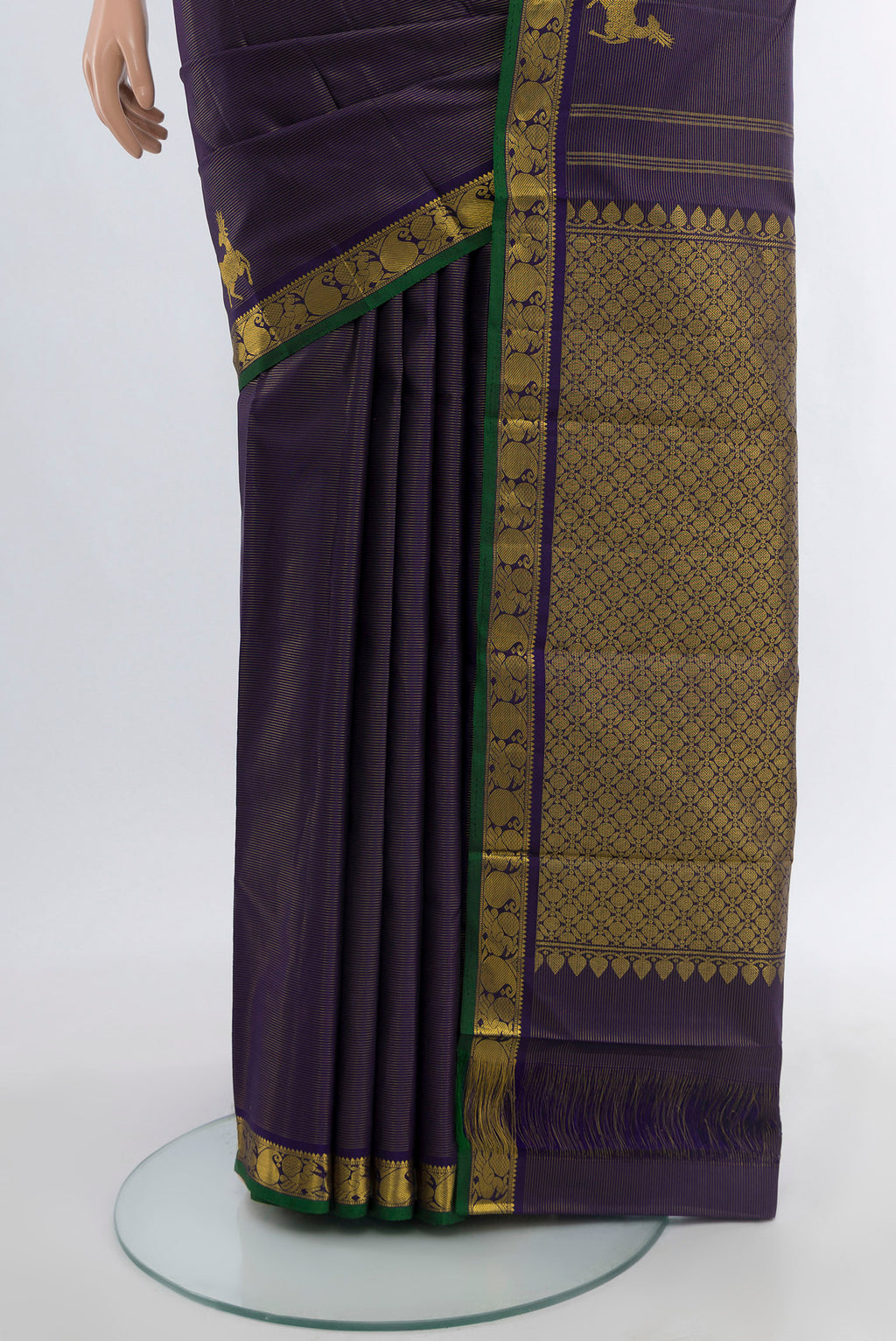 Pleats and pallu of Pure Silk Pure Zari Navy Blue Kanjivaram Saree with Zari Butta on the body and Silk Border. 
