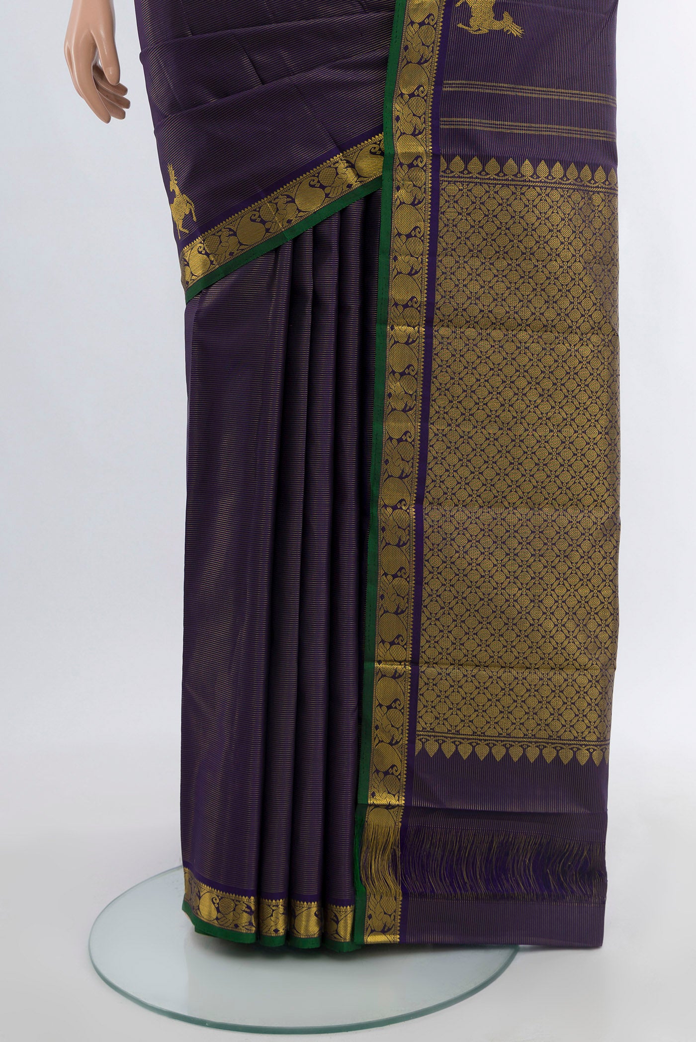 Pleats and pallu of Pure Silk Pure Zari Navy Blue Kanjivaram Saree with Zari Butta on the body and Silk Border. 