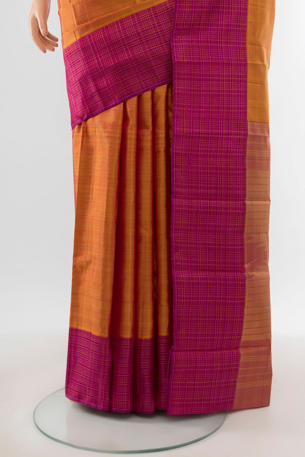 Pleats and pallu of Mustard Kanjivaram Silk Saree with Stripes on the body and Checks Border. 