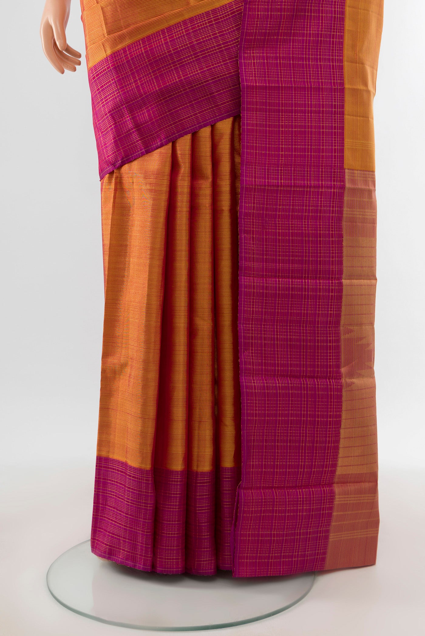 Pleats and pallu of Mustard Kanjivaram Silk Saree with Stripes on the body and Checks Border. 