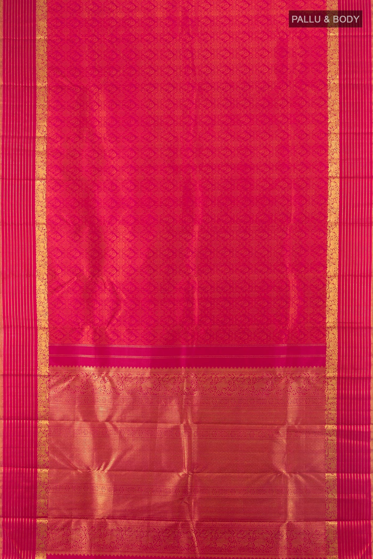 Flat view of Pure Silk Dark Pink Kanchipuram Saree with Jacquard design on the body and Zari Border. 