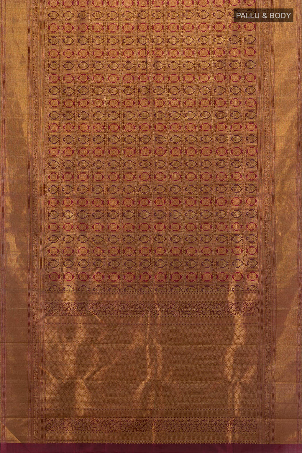 Flat view of Maroon Kanjivaram Silk Saree with Zari Brocade on the body and Zari Border. 
