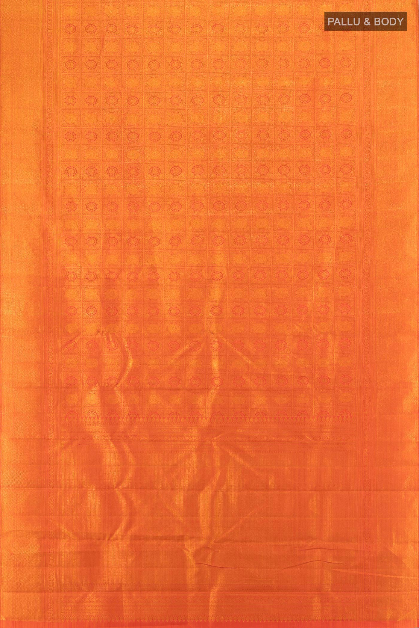 Flat view of Brick Orange Kanchipuram Silk Saree with Zari Brocade on the body and Zari Border. 