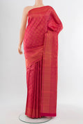 Dark Pink Kanchipuram Silk Saree with Zari Butta on the body and Silk Border.  displayed on a mannequin