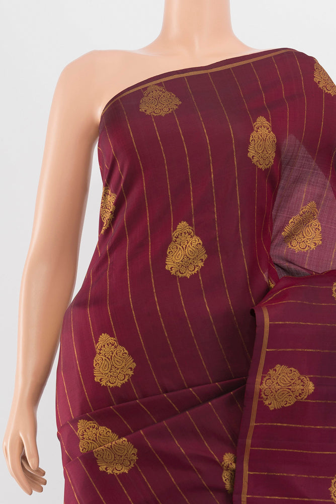 Border image of Maroon Kanjivaram Silk Saree with Zari Butta on the body and Silk Border. 