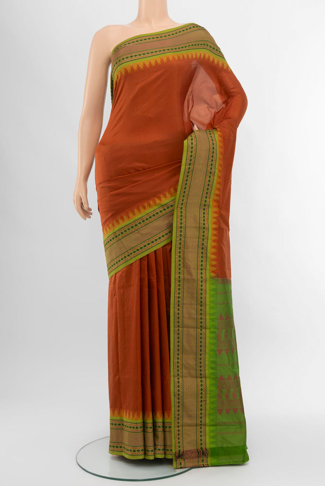 Rust Bangalore Silk - kadyal Saree with Plain Body and Silk Border.  displayed on a mannequin