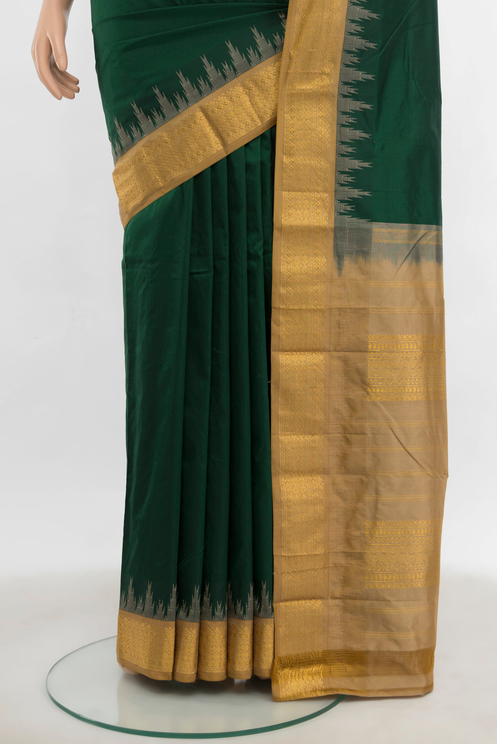 Pleats and pallu of Bottle Green Bangalore Silk Saree with Zari Butta on the body and Silk Border. 