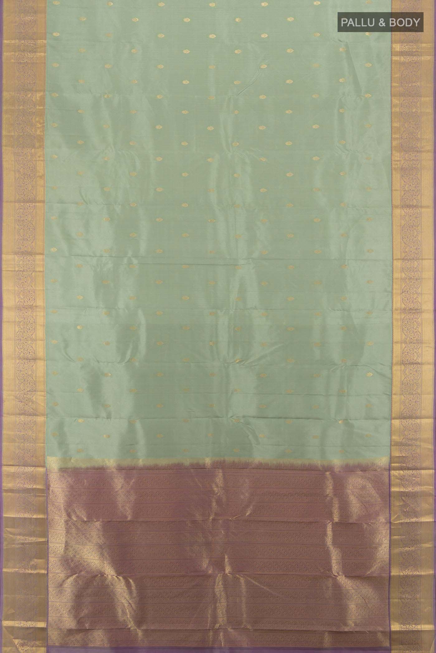 Flat view of Pista Green Kanchipuram Silk Saree with Zari Butta on the body and Silk Border. 