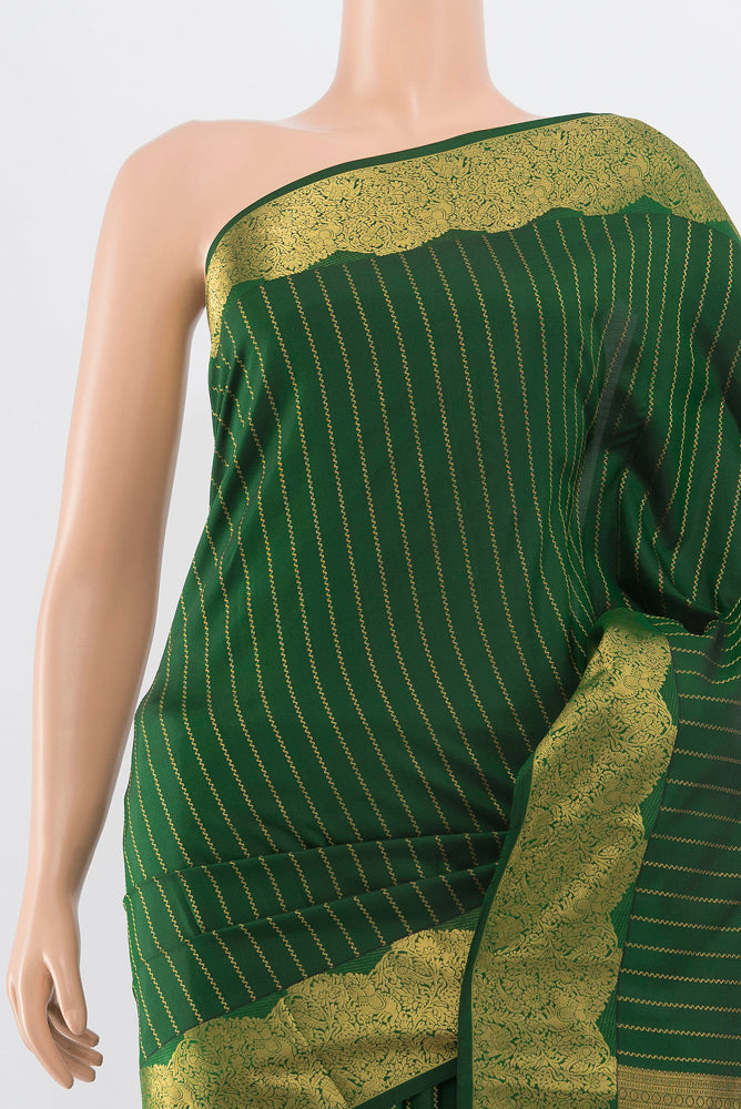 Border image of Pure Silk Pure Zari Bottle Green Kanchipuram Saree with Zari Butta on the body and Silk Border. 