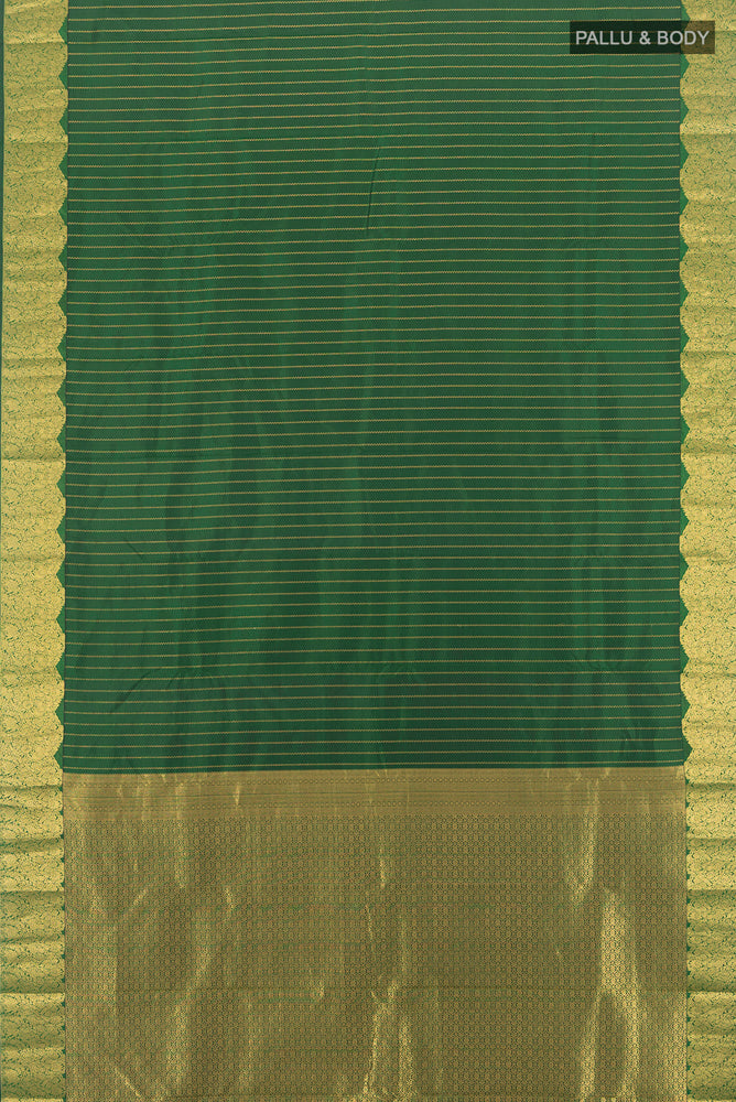Flat view of Pure Silk Pure Zari Bottle Green Kanchipuram Saree with Zari Butta on the body and Silk Border. 