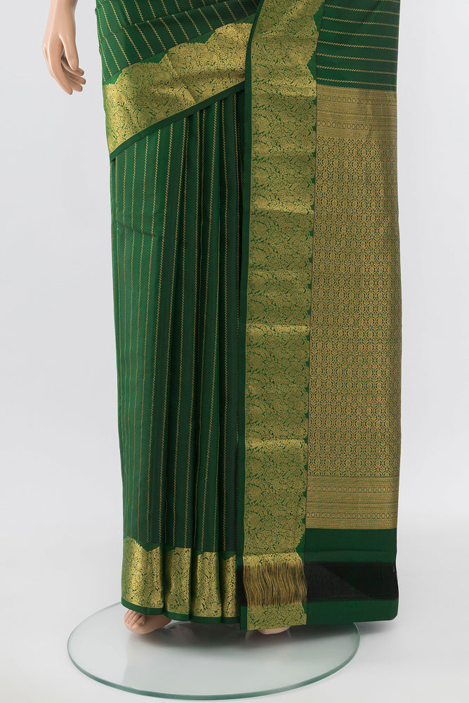 Pleats and pallu of Pure Silk Pure Zari Bottle Green Kanchipuram Saree with Zari Butta on the body and Silk Border. 