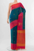 Peacock Blue Soft Silk Saree with Zari Butta on the body and Silk Border displayed on a mannequin
