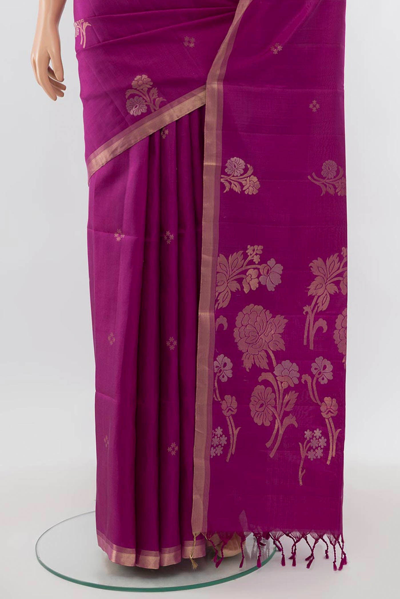 Pleats and pallu of Purple Soft Silk Saree with Zari Butta on the body and Zari Border. 
