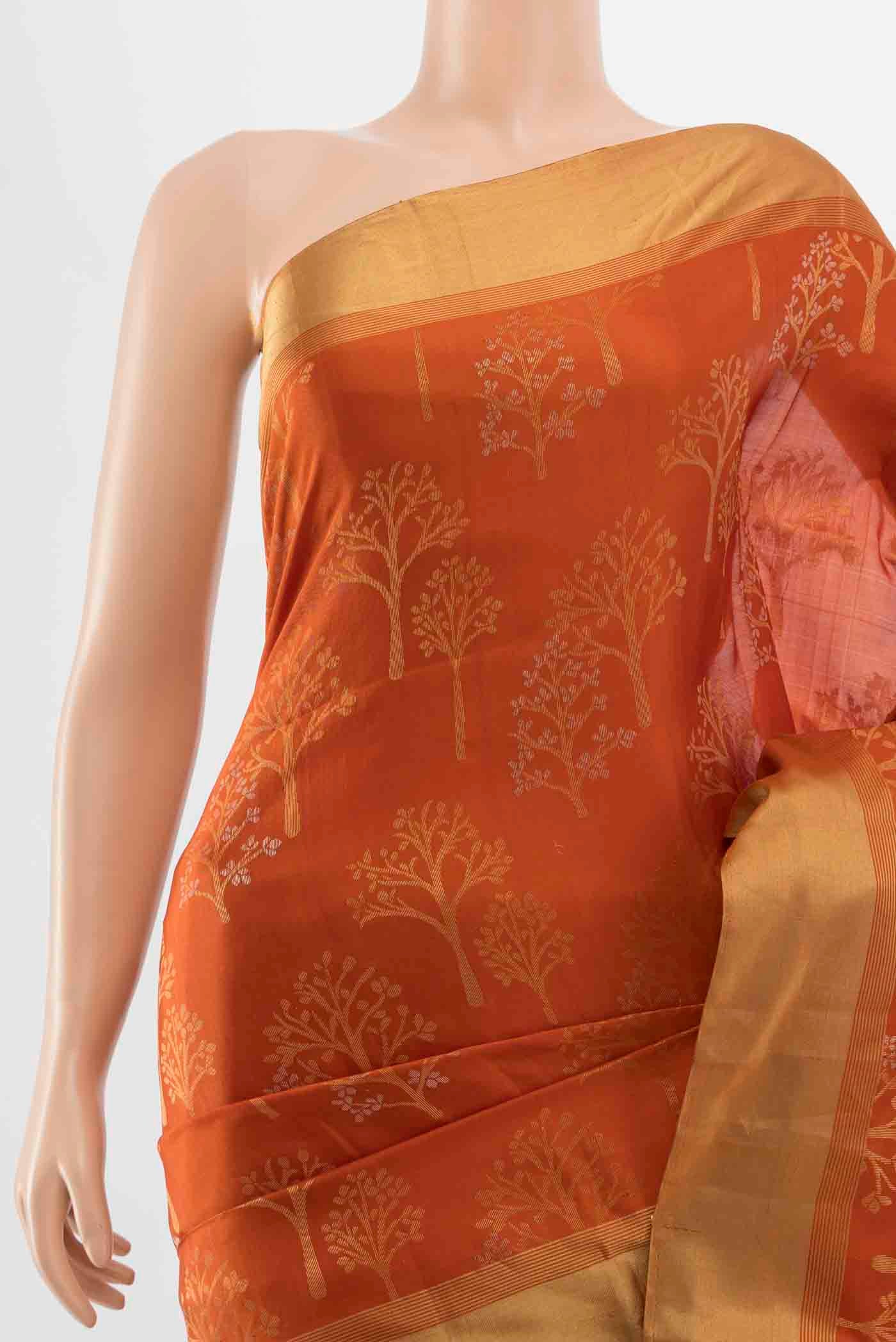Border image of Rust Soft Silk Saree with Zari Butta on the body and Silk Border