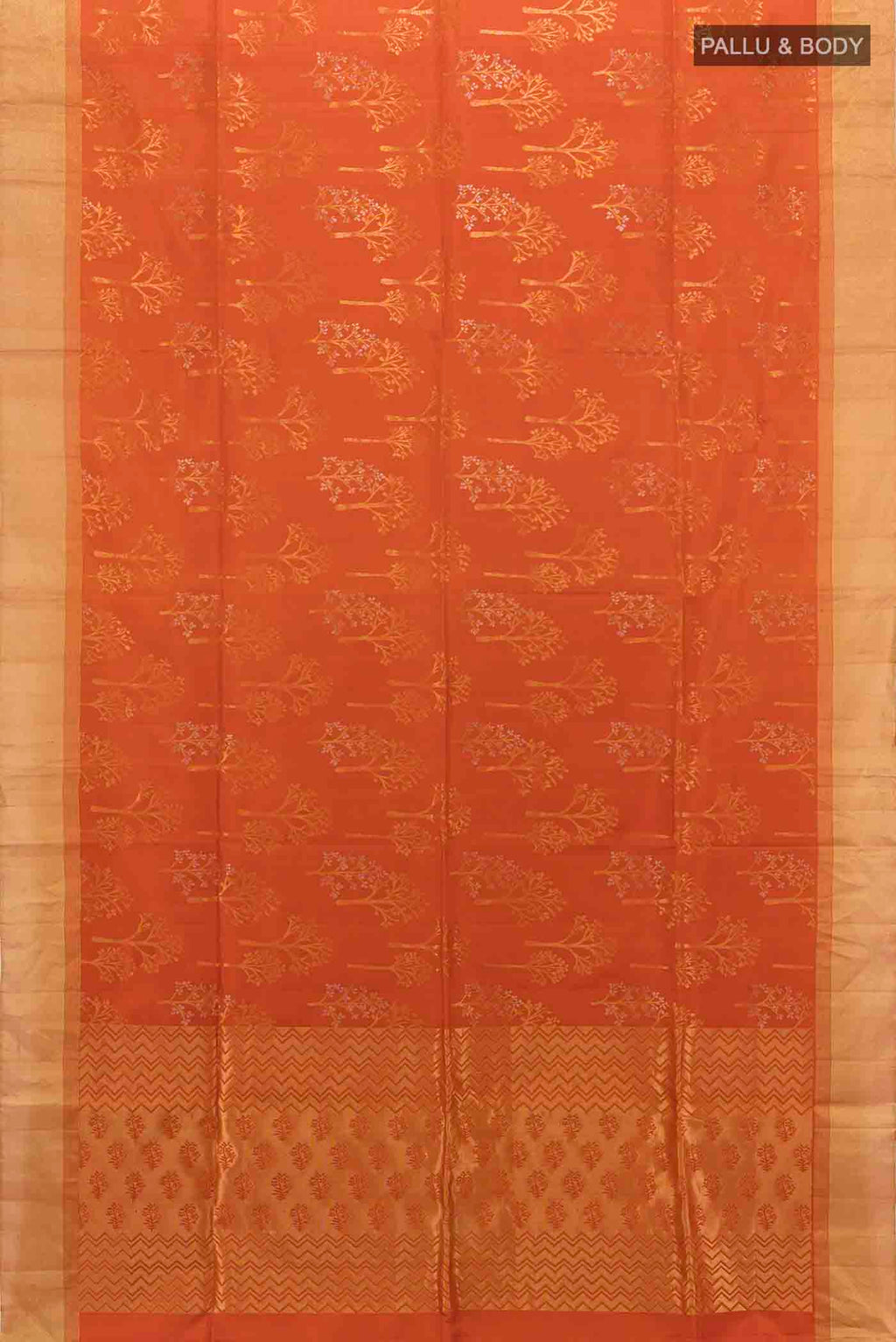 Flat view of Rust Soft Silk Saree with Zari Butta on the body and Silk Border