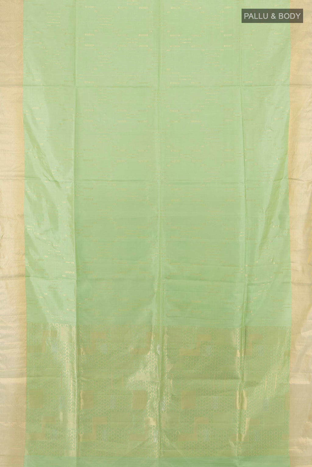 Flat view of Pista Green Soft Silk Saree with Zari Butta on the body and Zari Border. 