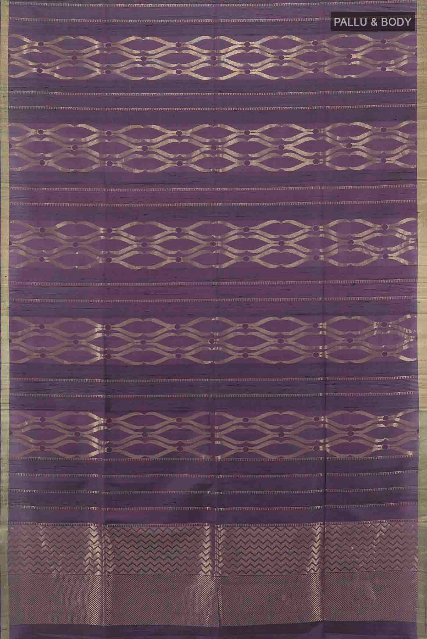 Flat view of Purple Soft Silk Saree with Zari Butta on the body and Silk Border. 