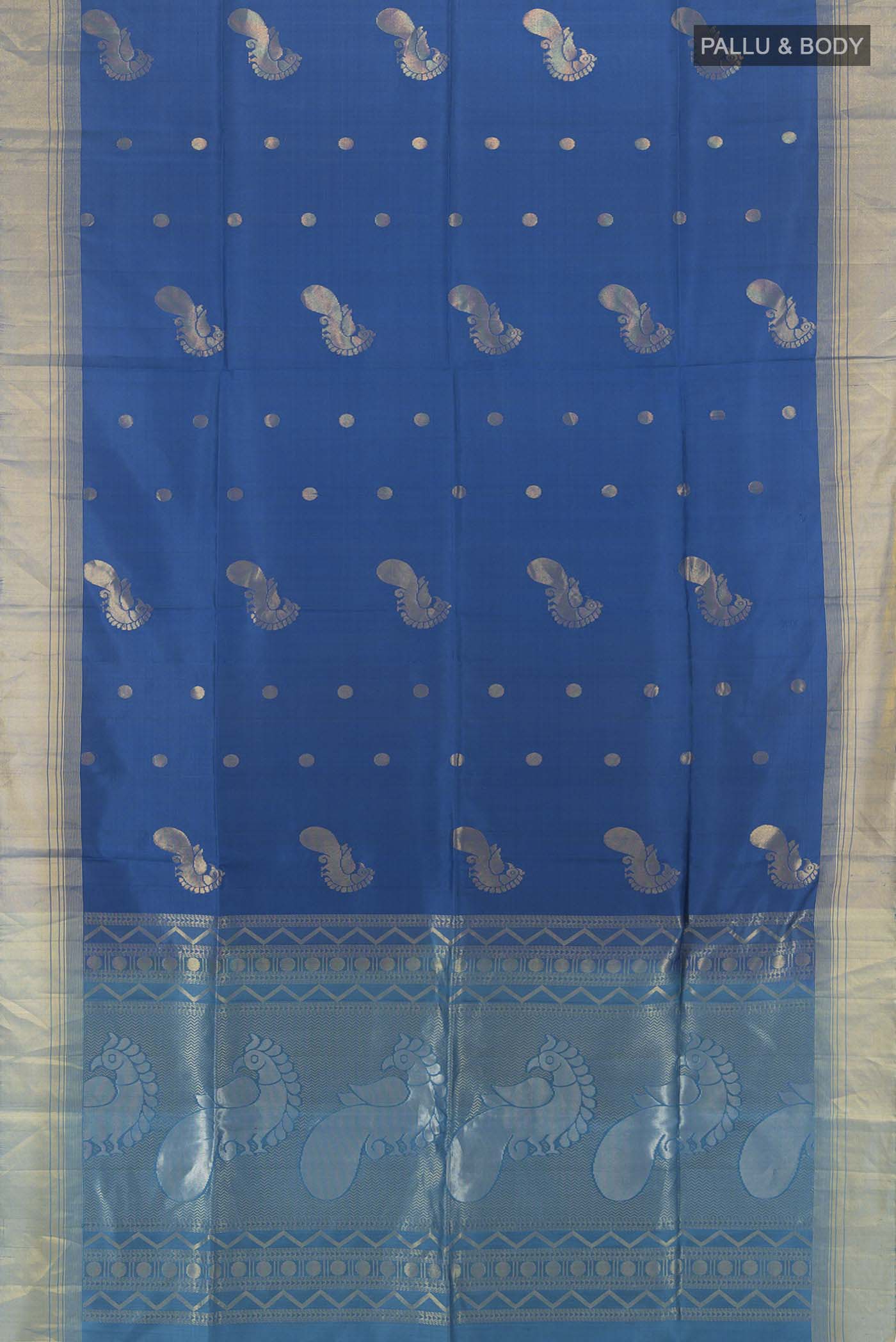 Flat view of Light Blue Soft Silk Saree with Zari Butta on the body and Silk Border. 