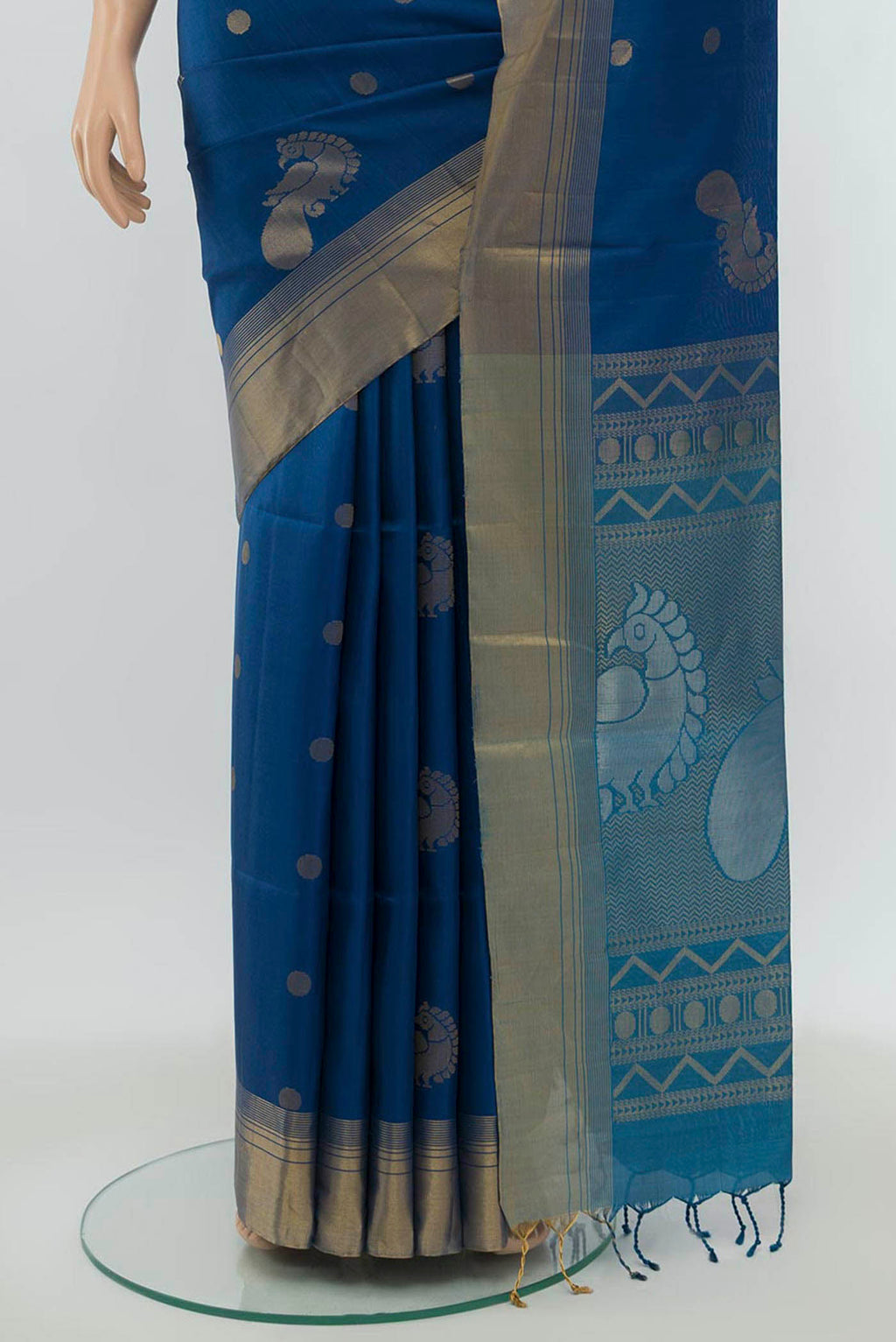 Pleats and pallu of Light Blue Soft Silk Saree with Zari Butta on the body and Silk Border. 