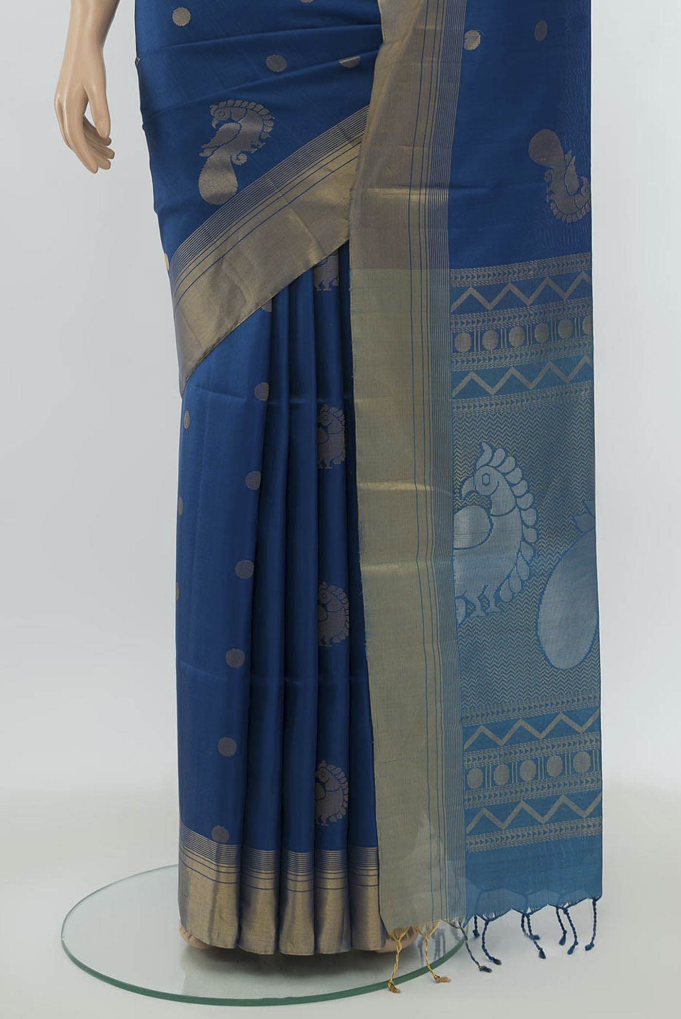 Pleats and pallu of Light Blue Soft Silk Saree with Zari Butta on the body and Silk Border. 