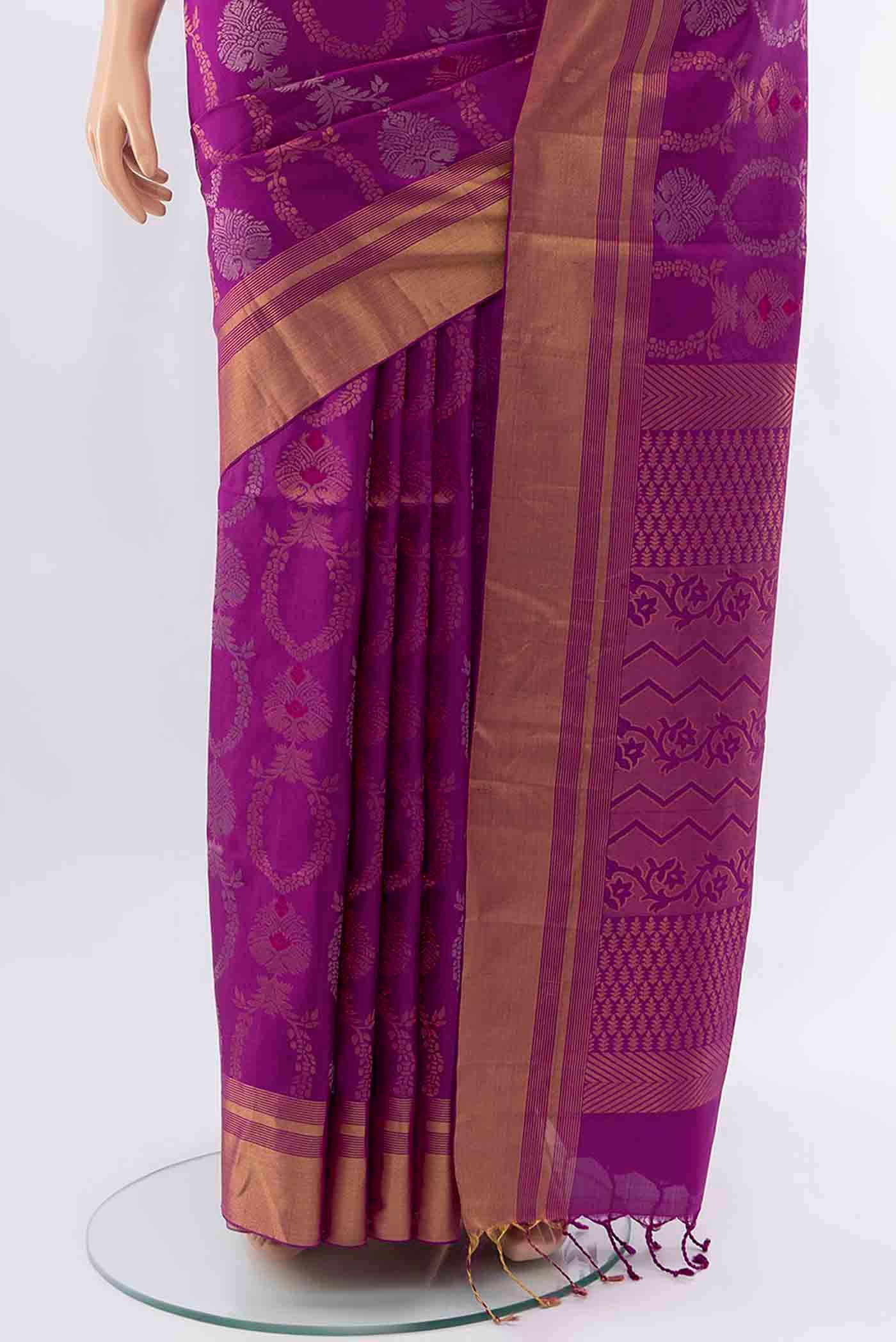 Pleats and pallu of Purple Soft Silk Saree with Zari Butta on the body and Silk Border