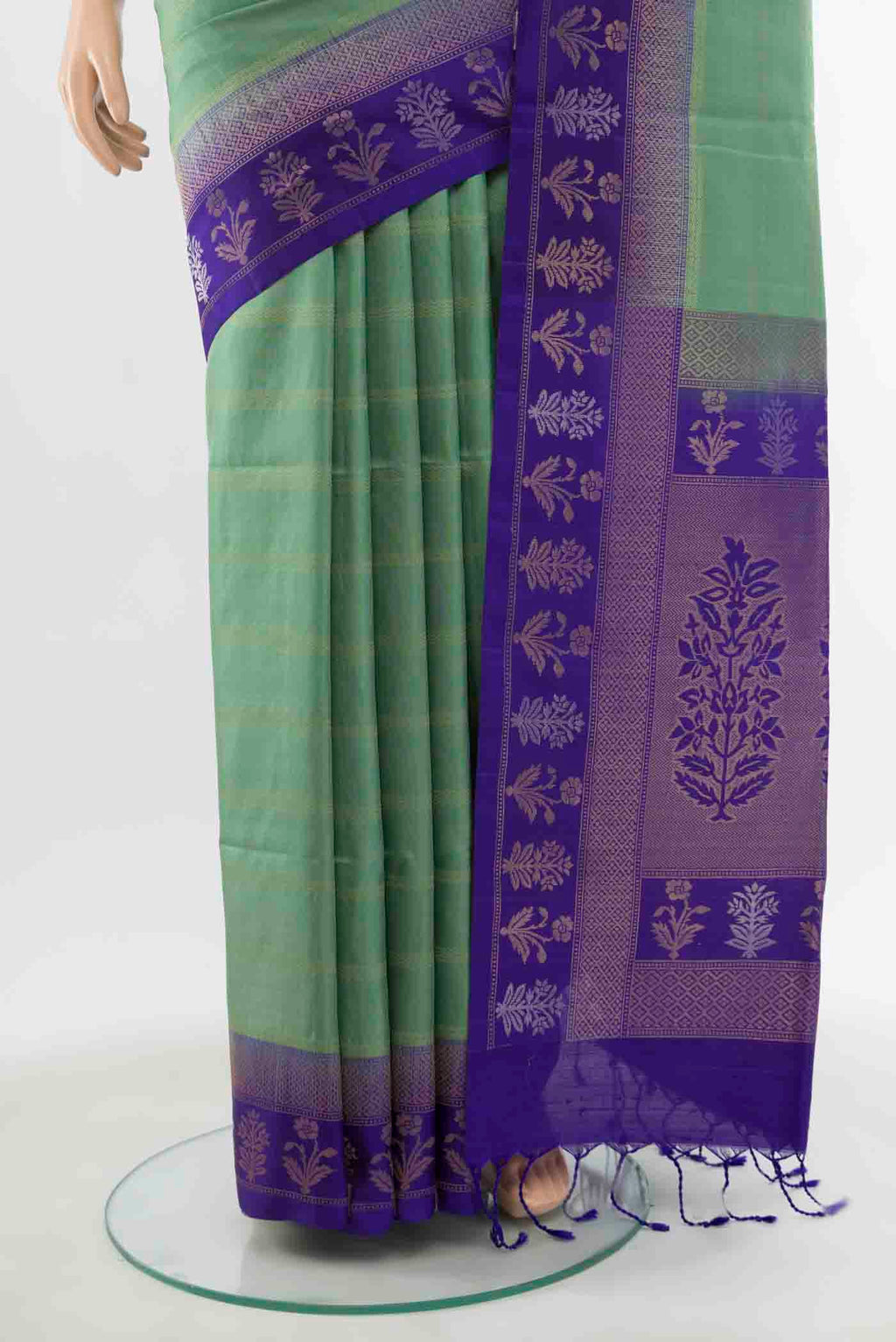 Pleats and pallu of Light Green Soft Silk Saree with Zari Butta on the body and Silk Border