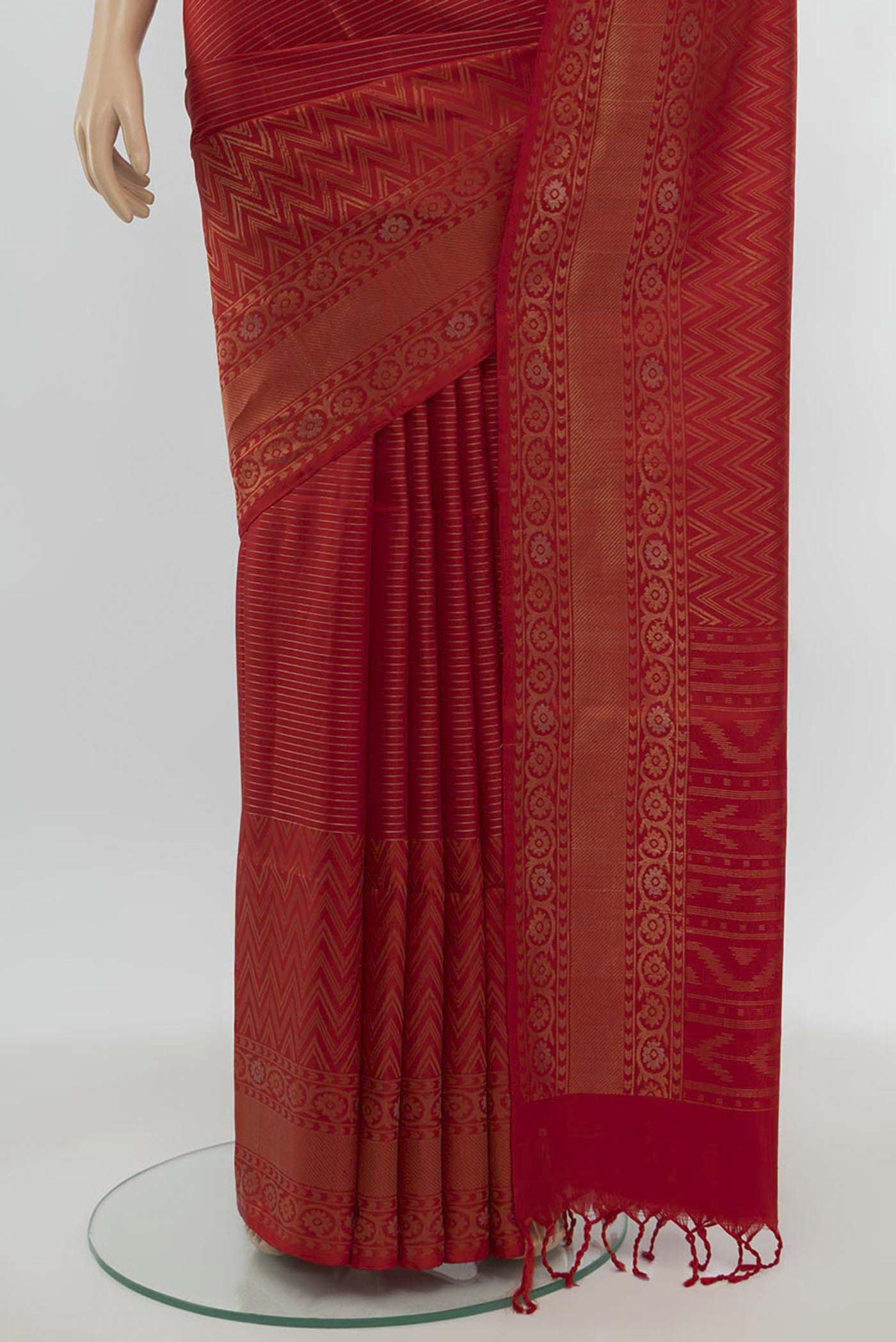 Pleats and pallu of Red Soft Silk Saree with Zari Butta on the body and Silk Border. 